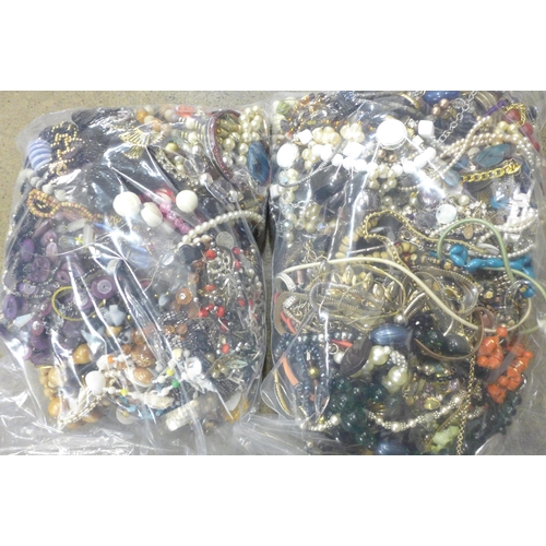 693 - Two bags of costume jewellery