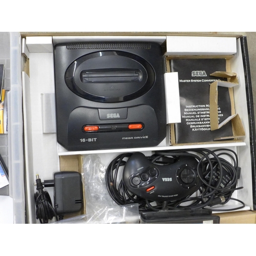 698 - A Sega Mega Drive II, 16 bit game console and games including Star Wars