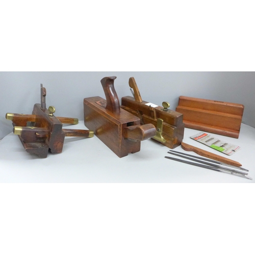 702 - Four vintage woodworking planes