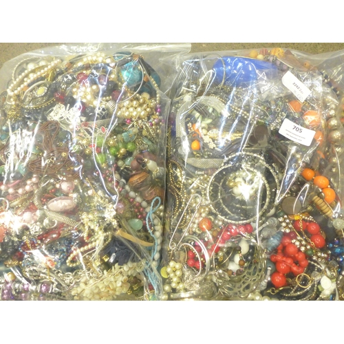 705 - Two bags of costume jewellery