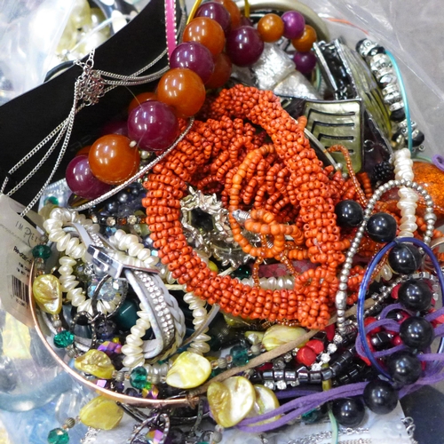 710 - Three bags of costume jewellery