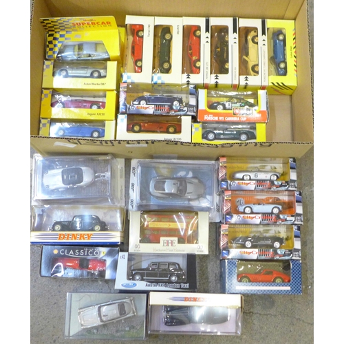 714 - A box of model vehicles including Matchbox, Dinky and James Bond themed