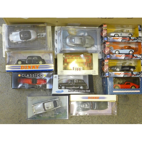 714 - A box of model vehicles including Matchbox, Dinky and James Bond themed