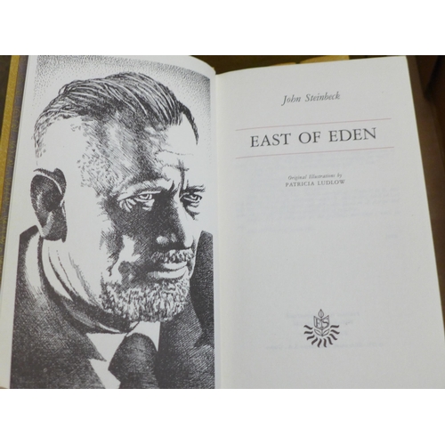 724 - A collection of John Steinbeck novels dating back to the 1930s