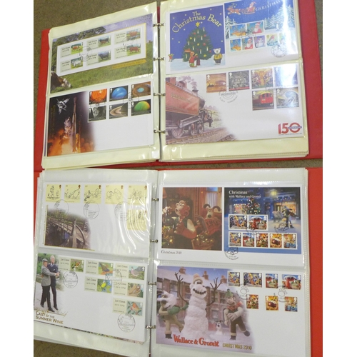 725 - A 2009-2013 range of over 100 first day covers with sets, mini-sheets and 