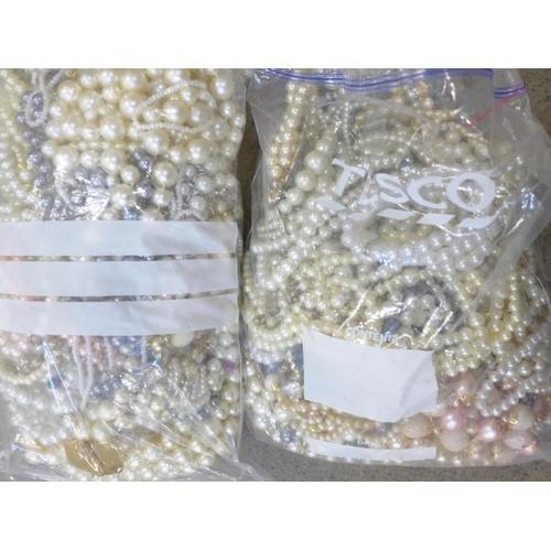 733 - A large collection of faux pearls