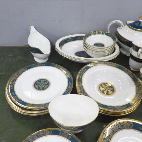 756 - A collection of Royal Doulton Carlyle fine bone china dinnerwares, seven dinner plates, six side pla... 