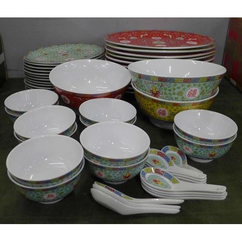 758 - A collection of oriental design banquet china, twelve large and small plates, twelve rice bowls and ... 