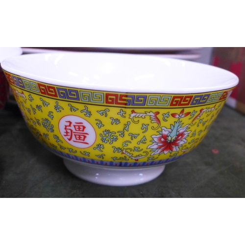 758 - A collection of oriental design banquet china, twelve large and small plates, twelve rice bowls and ... 