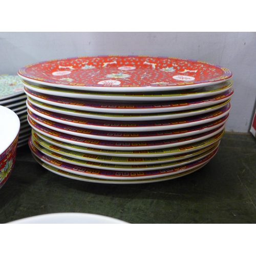 758 - A collection of oriental design banquet china, twelve large and small plates, twelve rice bowls and ... 