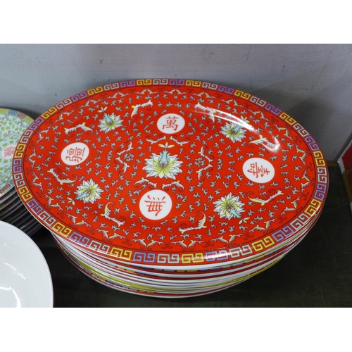 758 - A collection of oriental design banquet china, twelve large and small plates, twelve rice bowls and ... 