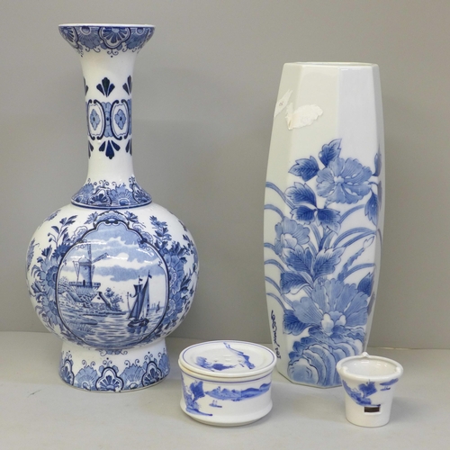 766 - A Delft vase, a blue and white oriental vase, lidded pot and strainer