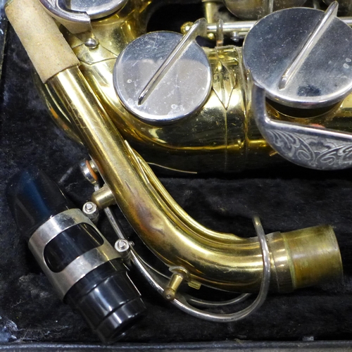 773 - A Corton saxophone with case