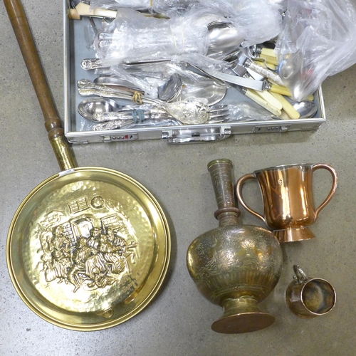 791 - An Indian brass vase, a copper tankard and a loving cup, a collection of cutlery and a bed warming p... 