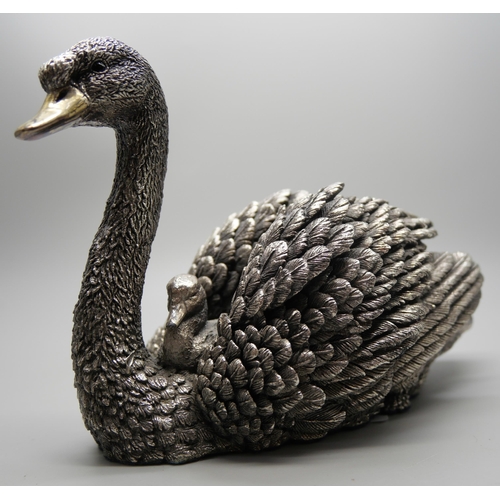 798 - A silver covered model of a swan with signet, hallmarked and stamped 'filled', 15 x 10cm