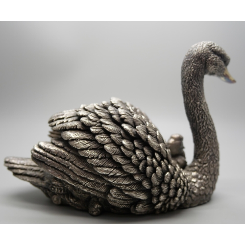 798 - A silver covered model of a swan with signet, hallmarked and stamped 'filled', 15 x 10cm