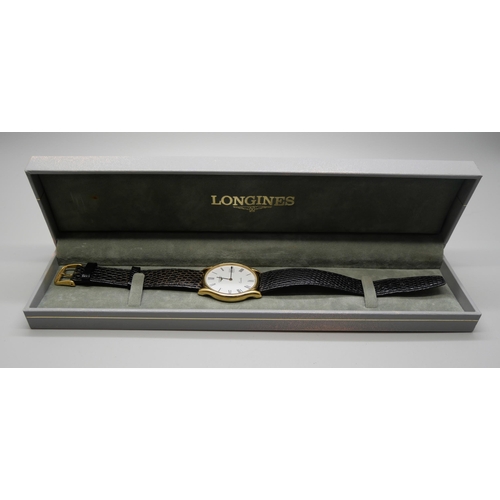 806 - A Longines quartz wristwatch with papers, 34mm including crown, boxed