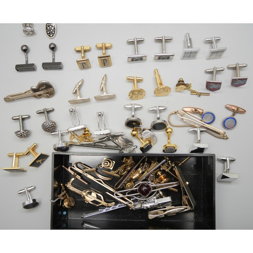 809 - 20 pairs of cufflinks and a collection of tie pins & slides