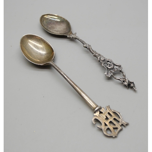 810 - A silver spoon with monogram handle and a .800 silver spoon, 24g