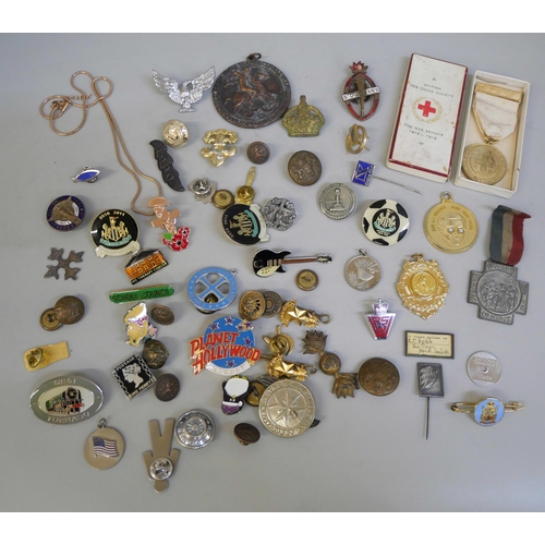 817 - A collection of badges, pins, buttons, etc.