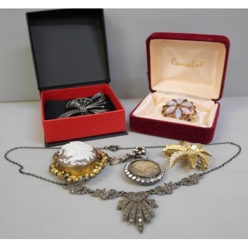 820 - A collection of jewellery including a silver and marcasite brooch and necklace, and other costume br... 