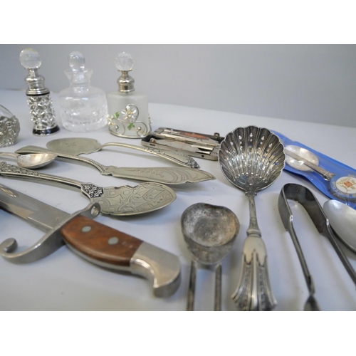 823 - A collection of silver plated items, scent bottles, etc.