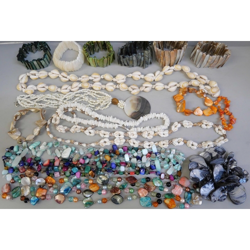 832 - A collection of mother of pearl and shell jewellery