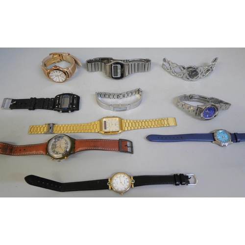 852 - A collection of wristwatches, including Seiko and Swatch