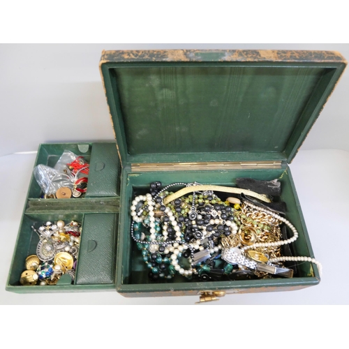 855 - Costume jewellery in a jewellery box, together with 1g of scrap 9ct gold, 3.6g of yellow metal, 0.6g... 