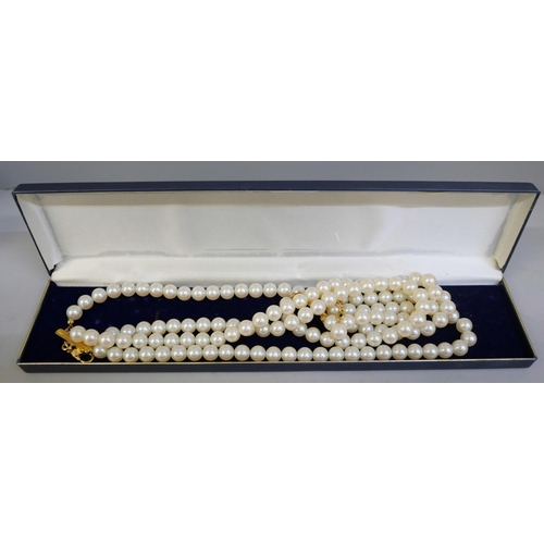 858 - A collection of strings of pearls with plated clasps, a string with a silver clasp and a small strin... 