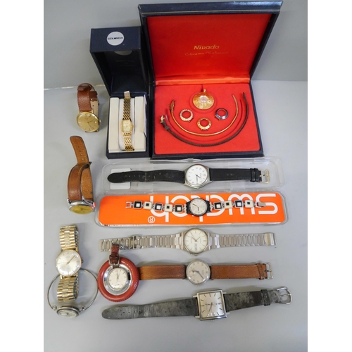 863 - A collection of wristwatches including Marvin in a pendant mount, Longines, and a .800 silver exampl... 