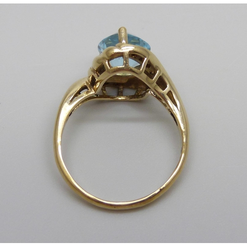 868 - A 9ct gold, topaz and diamond ring, 3.7g, N/O