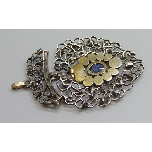 880 - A Georgian white and yellow metal pendant, set with rose cut diamonds and a Ceylon cabochon sapphire... 