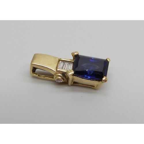 885 - A 14k gold and sapphire pendant, 2.3g, 1.8cm x 0.5cm