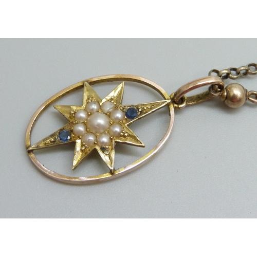 888 - A yellow metal pendant set with seed pearls, stamped 15c, 3.2 x 1.8cm, on a 9ct gold chain, 6.6g tot... 