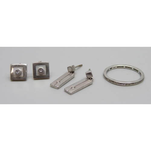 918 - Two pairs of silver and diamond set earrings including Kit Heath, and a silver and diamond Eternity ... 