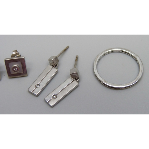 918 - Two pairs of silver and diamond set earrings including Kit Heath, and a silver and diamond Eternity ... 