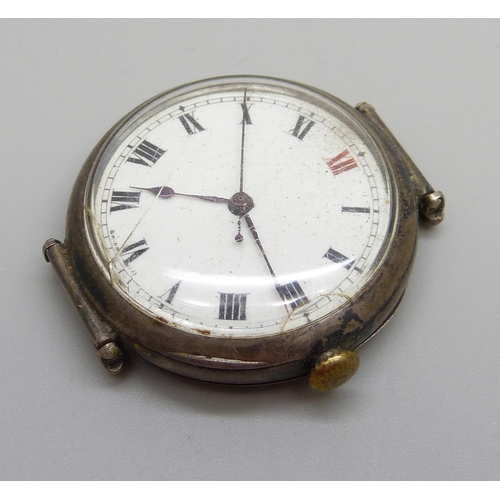 937 - A silver cased Longines trench watch, enamel dial with Roman numerals, red XII, movement marked Long... 