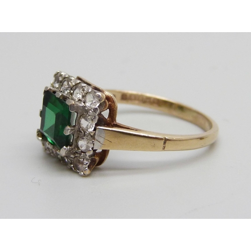 940 - A 9ct gold and spinel cluster ring with green central stone, 2.2g, L, and a small diamond ear stud