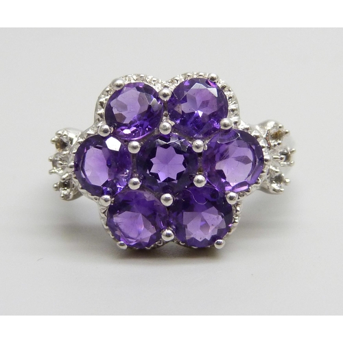 962 - A silver and amethyst ring, Q