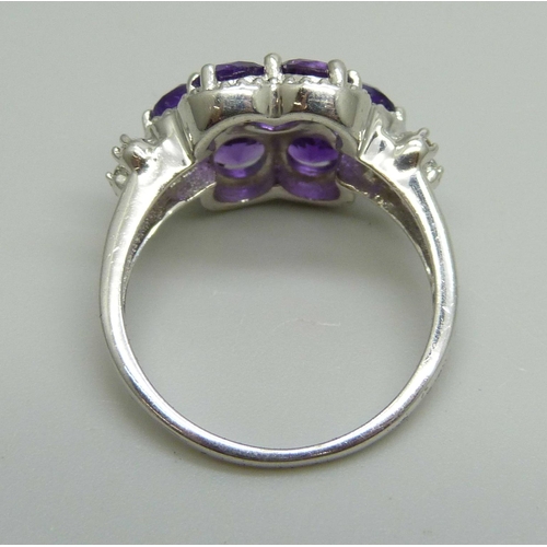 962 - A silver and amethyst ring, Q