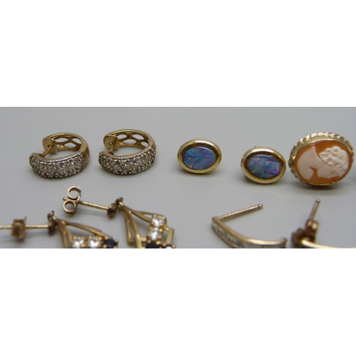 970 - Three pairs of 9ct gold earrings, a pair of 14ct gold and opal earrings and a pair of yellow metal e... 