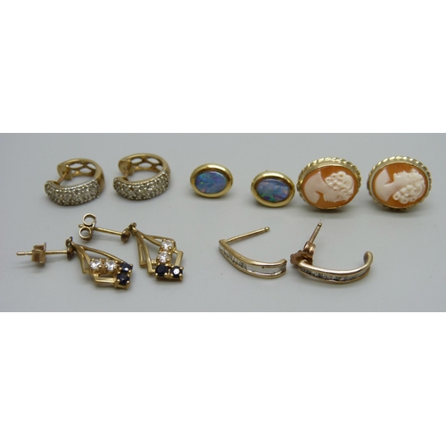 970 - Three pairs of 9ct gold earrings, a pair of 14ct gold and opal earrings and a pair of yellow metal e... 