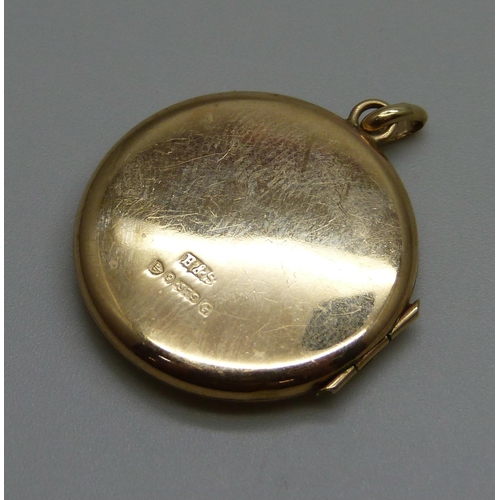 972 - A 9ct gold locket, 3.7g, 24mm