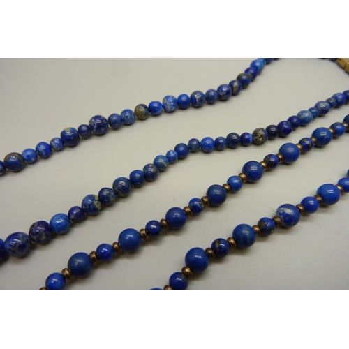 986 - A lapis lazuli choker and necklace, 38.5cm and 47cm, 67g total