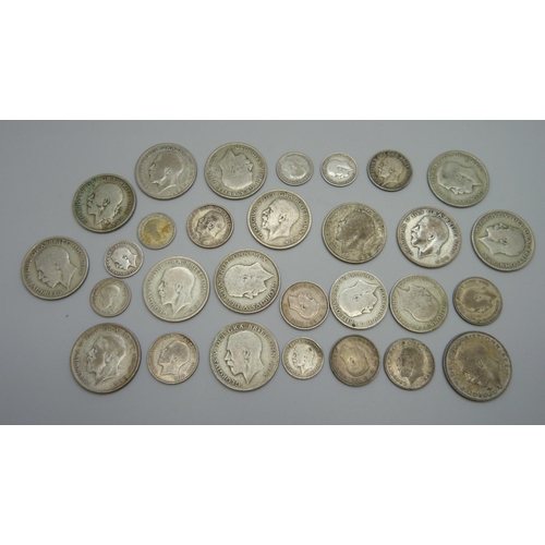 988 - A collection of 1920-1946 half silver coins, 260g, and one later coin