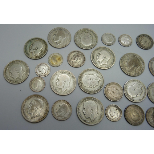 988 - A collection of 1920-1946 half silver coins, 260g, and one later coin