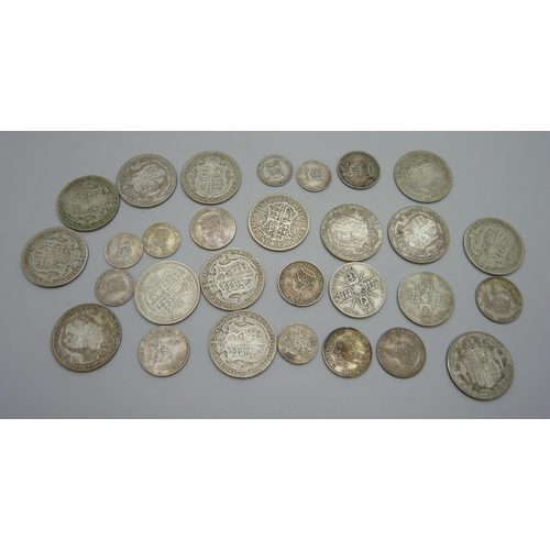 988 - A collection of 1920-1946 half silver coins, 260g, and one later coin