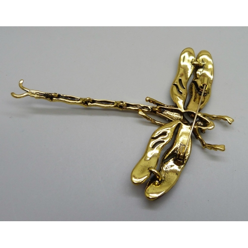 989 - A large articulated dragonfly brooch, 10cm x 8cm