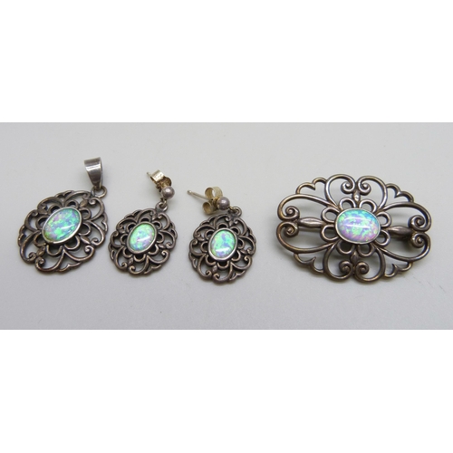 998 - A silver and synthetic opal jewellery set - a brooch, a pair of earrings and a pendant, 13g